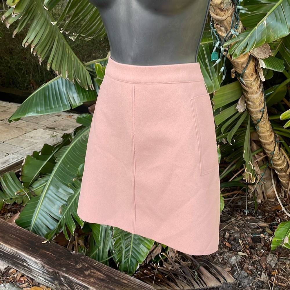 Top shop mini skirt with side, pockets, and raw hem